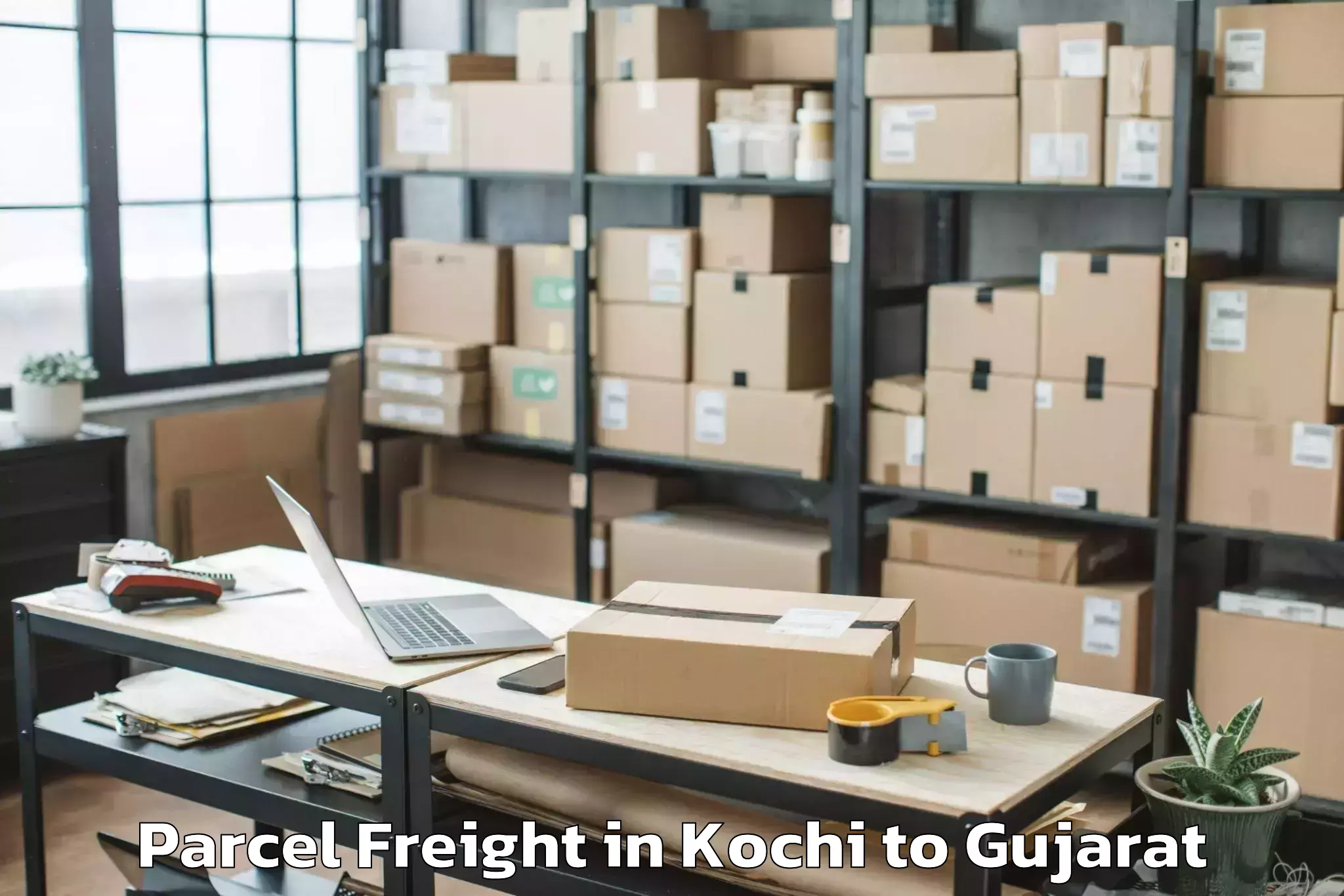 Top Kochi to Rai University Ahmedabad Parcel Freight Available